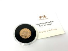 A 2015 gold full sovereign.