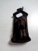 A Victorian cast iron dog's head door knocker