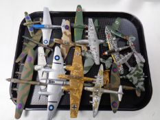 A tray containing a quantity of die cast military aircraft