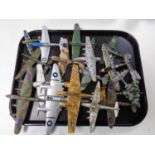 A tray containing a quantity of die cast military aircraft