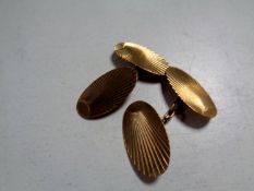 A pair of 9ct gold cuff links CONDITION REPORT: 4.