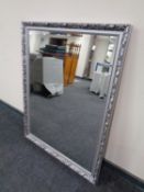 A contemporary silvered framed bevel edged overmantel mirror 86 cm x 112 cm