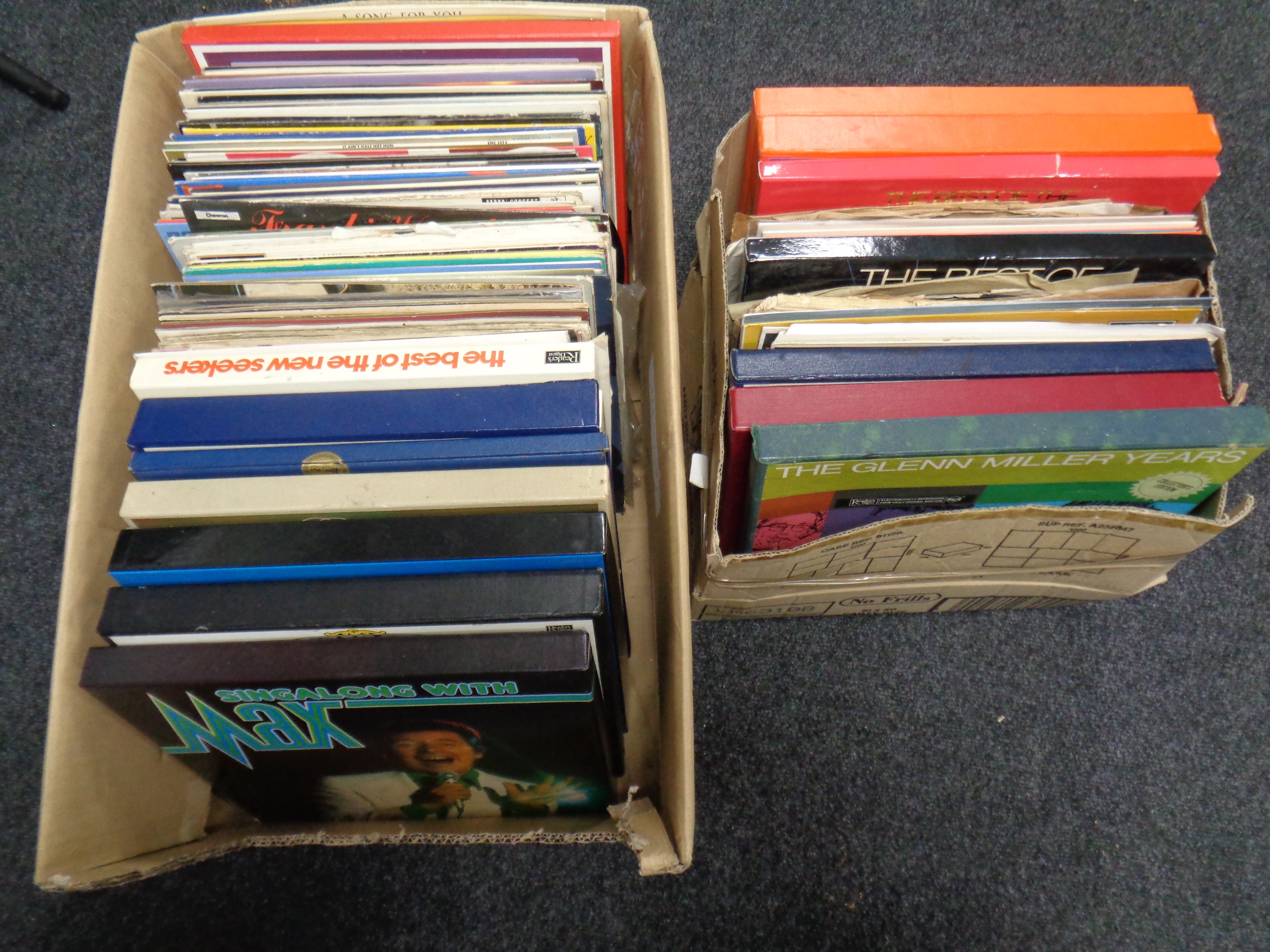 Two boxes containing a large quantity of vinyl LPs and box sets to include compilations,