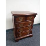 A Georgian style miniature five drawer chest,