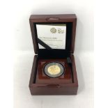 A Royal Mint 2020 1/4oz Britannia gold coin, in box with certificate.