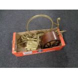 A box containing a retro style radio, a brass rocking chair,