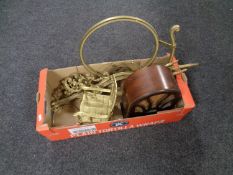 A box containing a retro style radio, a brass rocking chair,