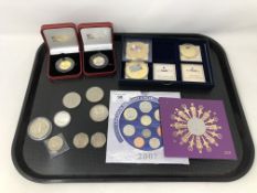 A tray of coins including two Pobjoy Mint commemorative 50p pieces, 1935 crown,