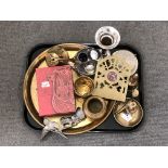 A tray containing brass and silver plated wares including circular serving tray, napkin rings,