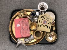 A tray containing brass and silver plated wares including circular serving tray, napkin rings,