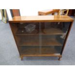 A set of 20th century sliding glass door bookshelves