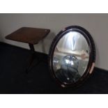 A Victorian mahogany pedestal occasional table together with an oval framed mirror (a/f)