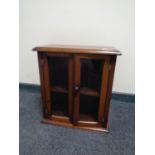 A 19th century mahogany double door table top cabinet