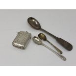 A silver vesta case and three silver spoons CONDITION REPORT: 39.3g gross.