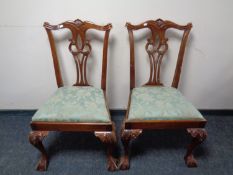 A pair of contemporary Chippendale style dining chairs on claw and ball feet
