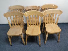 A set of six pine farmhouse style kitchen chairs