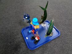 A tray containing Murano glass clown together with three further Venetian glass dog and fish