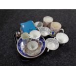 A tray containing assorted ceramics to include a 19th century hand painted tea bowl with saucer,