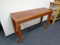 A reproduction Victorian style console table