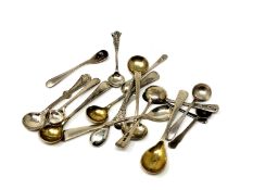 Seventeen silver salt and mustard spoons.