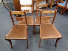 A set of four Reprodux brass inlaid dining chairs (brown seats)