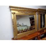 A Victorian style gilt framed bevel edged over mantel mirror,