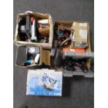 Two boxed circular saws together with a further box containing Black and Decker router, cased drill,