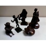 Four bronze figures to include geisha, nude study of a man, monkey,