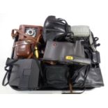 A tray containing 20th century cameras to include Polaroid, Kodak,