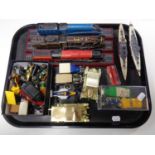 A tray containing assorted die cast vehicles, delivery vans,