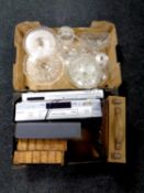 A box containing a quantity of cut glass together with a further box containing Toshiba VCR,