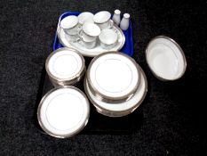 A tray containing a Noritake Crestwood platinum tea and dinner service
