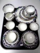 A tray containing twenty one piece oriental style Crown Staffordshire bone china tea service