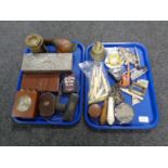 A box of collectables including an antique corkscrew, AA badge, table lighter in the form of a boat,