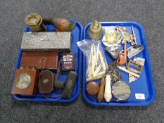 A box of collectables including an antique corkscrew, AA badge, table lighter in the form of a boat,