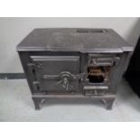 An antique cast iron stove