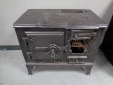 An antique cast iron stove