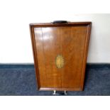 An Edwardian oak twin handled serving tray