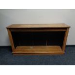 An Edwardian oak bookcase base