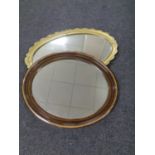 An Edwardian oval bevel edged mirror together with a gilt framed bevel edged mirror