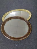 An Edwardian oval bevel edged mirror together with a gilt framed bevel edged mirror