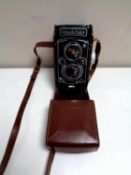 A vintage Franke and Heidecke Rolleiflex camera in leather case