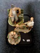 A tray containing a Capodimonte figure, Tramp on bench,