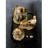 A tray containing a Capodimonte figure, Tramp on bench,