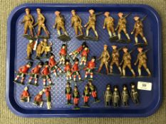 A tray of 20th century hand-painted die cast military figures including British marching troops in