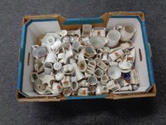 A box containing a large quantity of crested china