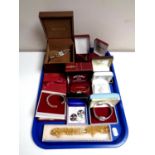 A tray containing assorted costume jewellery, silver pendant on chain, Celtic earrings,