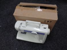 A JMB electric sewing machine with foot pedal in box