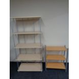 A set of metal and pine effect five tier shelves together with a further three tier shelving unit