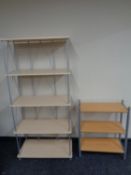 A set of metal and pine effect five tier shelves together with a further three tier shelving unit